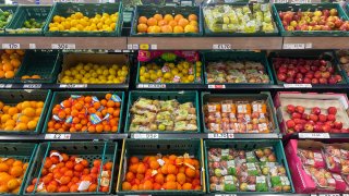 Fruit and vegetables are offered for sale inside a branch of the supermarket retailer Sainsbury’s in Bristol, England.