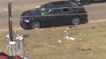 A long gun was seen in the grass after a shooting involving Cedar Hill Police officers and an active shooter call, Tuesday, July 25, 2023.