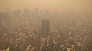 Haze is visible in New York City from the Empire State Building observatory, June 7, 2023, in New York.