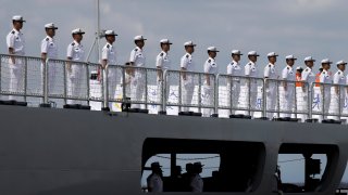 FILE – Chinese navy sailors stand in formation on board the naval training ship, Qi Jiguang, as it docks at Manila’s port, Philippines Wednesday, June 14, 2023. China says it’s navy ships are preparing for joint exercises with Russia’s sea forces in a sign of Beijing’s continuing support for Moscow’s invasion of neighboring Ukraine.