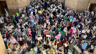 Hundreds of people descend on the Nebraska Capitol to protest plans by conservative lawmakers in the Nebraska Legislature to revive an abortion ban