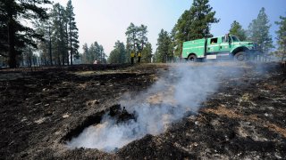 FILE – A U.S. Forest Service fire truck in Greer, Arizona