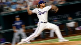 ARLINGTON, TX – JULY 19: Jon Gray #22 of the Texas Rangers pitches against the Tampa Bay Rays during the fourth inning at Globe Life Field on July 19, 2023 in Arlington, Texas.