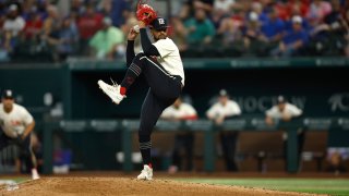 ARLINGTON, TEXAS – JULY 15: Grant Anderson #65 of the Texas Rangers pitches in the sixth inning against the Cleveland Guardians at Globe Life Field on July 15, 2023 in Arlington, Texas. (Photo by Tim Heitman/Getty Images)