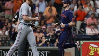 HOUSTON, TEXAS – JULY 24: Kyle Tucker #30 of the Houston Astros scores in the fifth inning against the Texas Rangers at Minute Maid Park on July 24, 2023 in Houston, Texas.