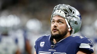 Dallas Cowboys offensive guard Zack Martin (70) looks up as he exits the field after warmups before a game against the New Orleans Saints at the Superdome in New Orleans, Louisiana on Sunday, September 29, 2019.