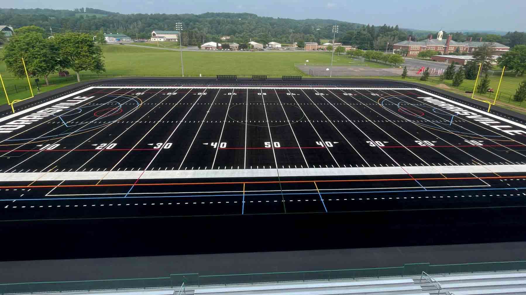 division-iii-football-team-unveils-black-turf-at-stadium