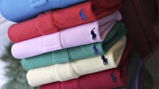 Ralph Lauren Polo shirts are on display in a store window in New York.