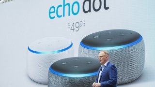 David Limp, senior vice president of devices and services at Amazon.com Inc., presents the Amazon Echo Dot smart speaker during an unveiling event at the company’s Spheres headquarters in Seattle, Sept. 20, 2018.