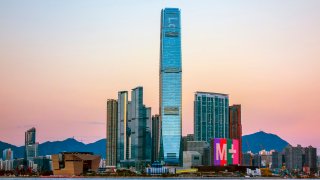 The ICC International Commerce Centre, and Hong Kong’s brand new museum of visual culture, Victoria harbor, Hong Kong, China.
