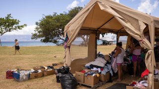 Donated clothes for those affected by the Maui fires are stored at Honokowai Beach Park in western Maui, Hawaii, Aug. 14, 2023.