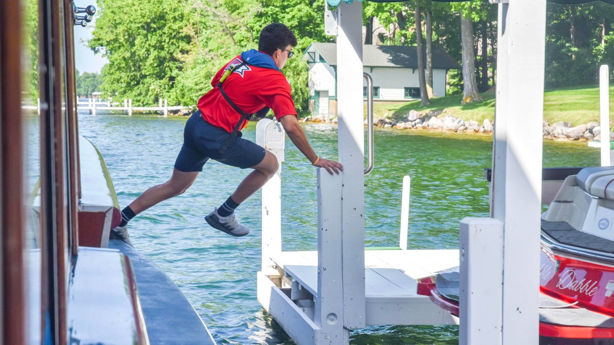 'The coolest summer job': These teens jump off a moving boat to deliver mail in Wisconsin – NBC 5 Dallas-Fort Worth - Vimarsana News