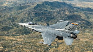 An F-16 assigned to the 162nd Wing, Morris Air National Guard Base, Tucson, Ariz., soars over the skies during a recent training Mission. Morris ANG Base is home to the Air National Guard’s premier F-16 fighter pilot training unit, the 162nd Wing. It is one of the largest ANG wings in the country and resides next to the Tucson International Airport. The wing shares use of the runway, security and fire control with the airport. Guardsmen provide ready forces in support of civil authorities and wartime operations.