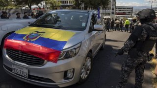 A hearse transporting the body of slain presidential candidate Fernando Villavicencio departs from the morgue in Quito, Ecuador, Thursday, Aug. 10, 2023