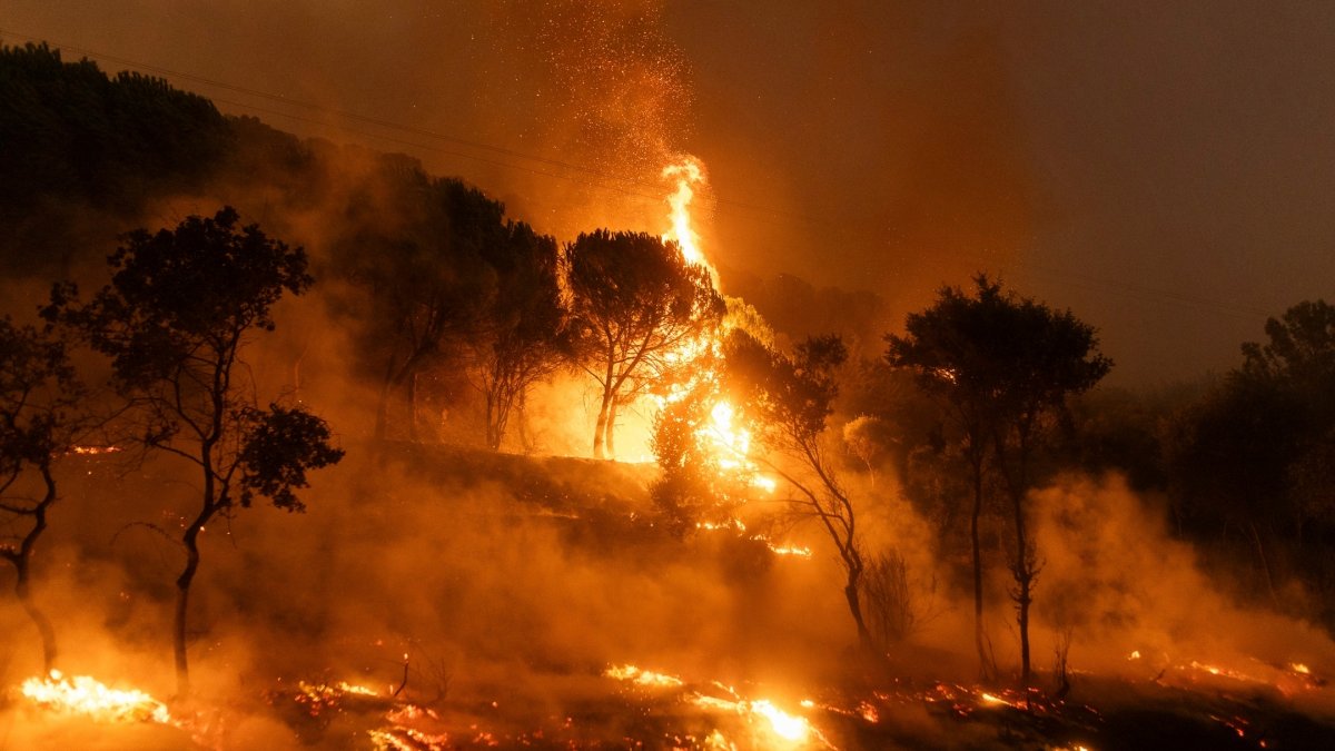 At least 18 bodies found in Greece as firefighters battle wildfires across the country