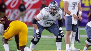 FILE - Eastern Michigan Eagles offensive lineman Brian Dooley (77) lines up during the college football game between the Eastern Michigan Eagles and the Arizona State Sun Devils on Sept. 17, 2022 at Sun Devil Stadium in Tempe, Arizona.