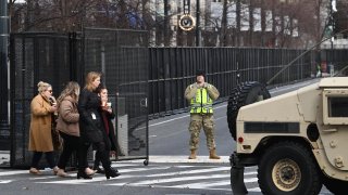 WASHINGTON, DC – DECEMBER 12: A member of the DC National Guard stands along New York Ave. NW not far from the Walter E. Washington Convention Center ahead of the U.S.-Africa Leaders Summit that runs from Tuesday through Thursday as seen on Monday December 12, 2022 in Washington, DC. (Photo by Matt McClain/The Washington Post via Getty Images)