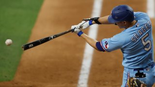 Corey Seager #5 of the Texas Rangers bats in the fifth inning against the Cleveland Guardians at Globe Life Field on July 16, 2023 in Arlington, Texas.