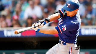 MINNEAPOLIS, MINNESOTA – AUGUST 27: Corey Seager #5 of the Texas Rangers hits a single against the Minnesota Twins in the ninth inning at Target Field on August 27, 2023 in Minneapolis, Minnesota. The Twins defeated the Rangers 7-6 in 13 innings.