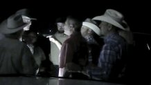 In this screen grab from body camera footage released by The Texas Department of Public Safety on Monday, Aug. 14, 2023, U.S. Rep. Ronny Jackson of Texas is seen arguing with officers outside a rodeo near Amarillo, Texas, in July. The video shows Jackson being taken to the ground by officers and profanely berating them. The congressman later said he was trying to help a person who needed medical care before officers intervened. (The Texas Department of Public Safety via AP)