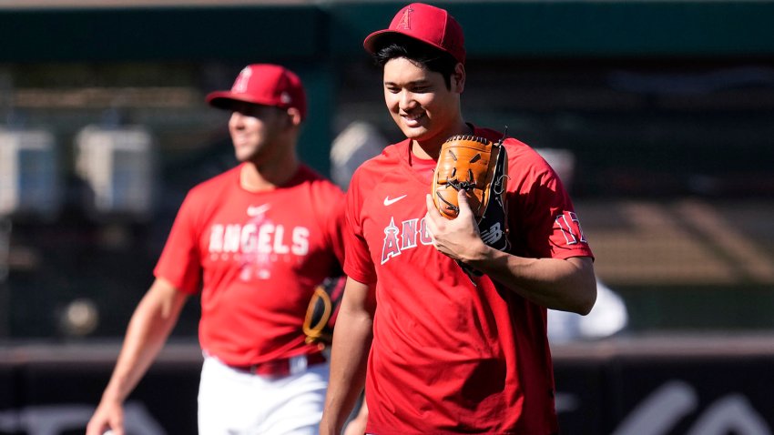 ANAHEIM, CALIFORNIA – AUGUST 7: Pitcher Shohei Ohtani #17 of the Los Angeles Angels walks back to the clubhouse after warming before the game against San Francisco Giants at Angel Stadium of Anaheim on August 7, 2023 in Anaheim, California.   (Photo by Kevork Djansezian/Getty Images)