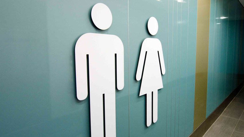 Generic image of men’s and women’s bathroom signs.