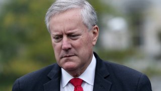Mark Meadows, White House chief of staff, listens to a question from a member of the media outside of the White House in Washington, D.C., U.S., on Wednesday, Oct. 21, 2020.