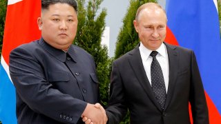 Russian President Vladimir Putin, right, and North Korea’s leader Kim Jong Un shake hands during their meeting in Vladivostok, Russia, Thursday, April 25, 2019.