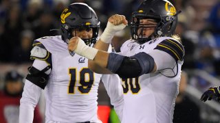 California nose tackle Brett Johnson, right, celebrates a sack with linebacker Cameron Goode during the first half of the team’s NCAA college football game against UCLA on Saturday, Nov. 30, 2019, in Pasadena, Calif. When California opens the season at North Texas on Saturday, Golden Bears defensive lineman Brett Johnson may need a minute to soak in the moment. After missing two full seasons to deal with grueling injuries, Johnson is set to play a game for the first time in 1,001 days since a win over Oregon in an empty stadium on Dec. 5, 2020.