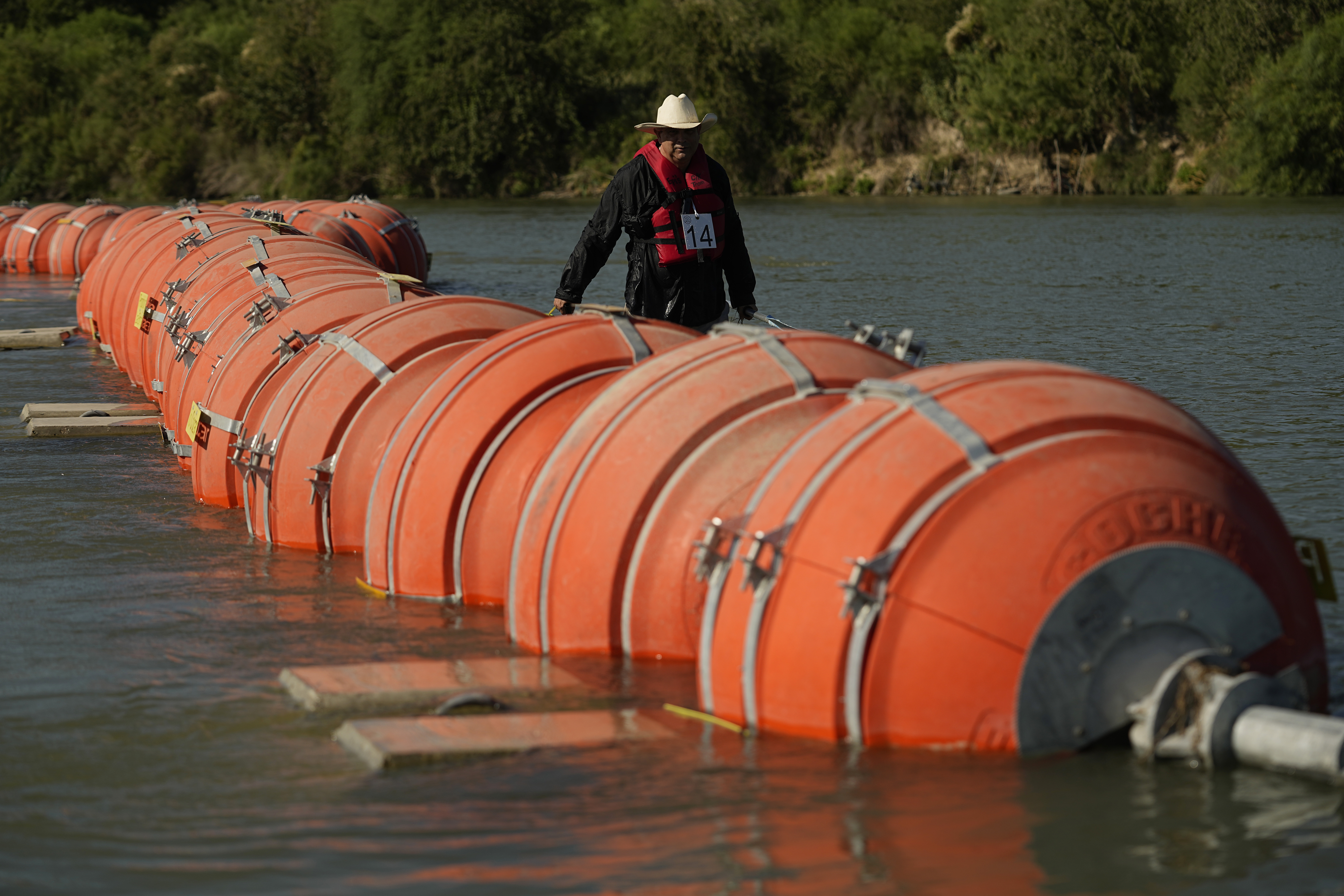 Judge orders Texas to move buoys from waters of US-Mexico border