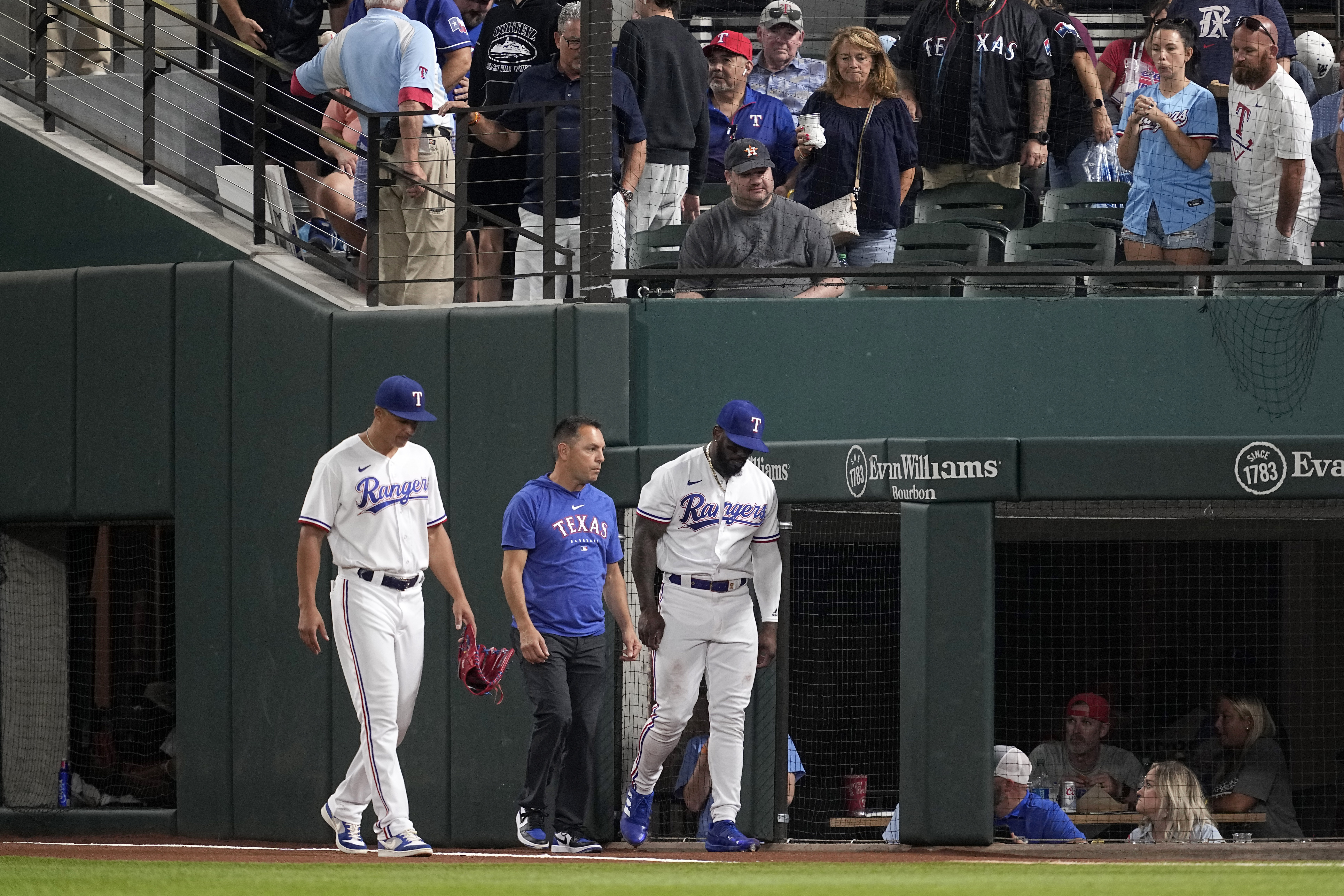 Adolis Garcia of the Texas Rangers rounds the bases after hitting a News  Photo - Getty Images