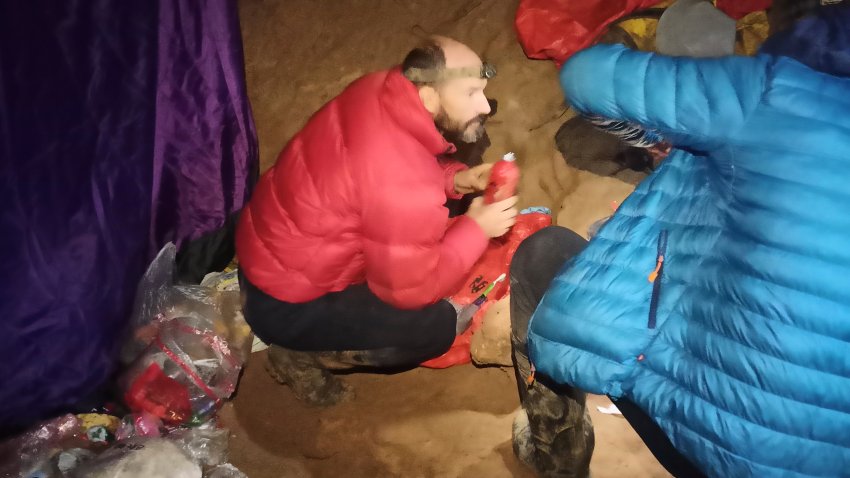 American caver Mark Dickey, left, 40, talks to a colleague inside the Morca cave near Anamur, southern Turkey, Thursday, Sept. 7, 2023. Turkish and international cave rescue experts are working to save an American speleologist trapped at a depth of more than 1,000 meters (3,280 feet) in a cave in southern Turkey after he became ill.