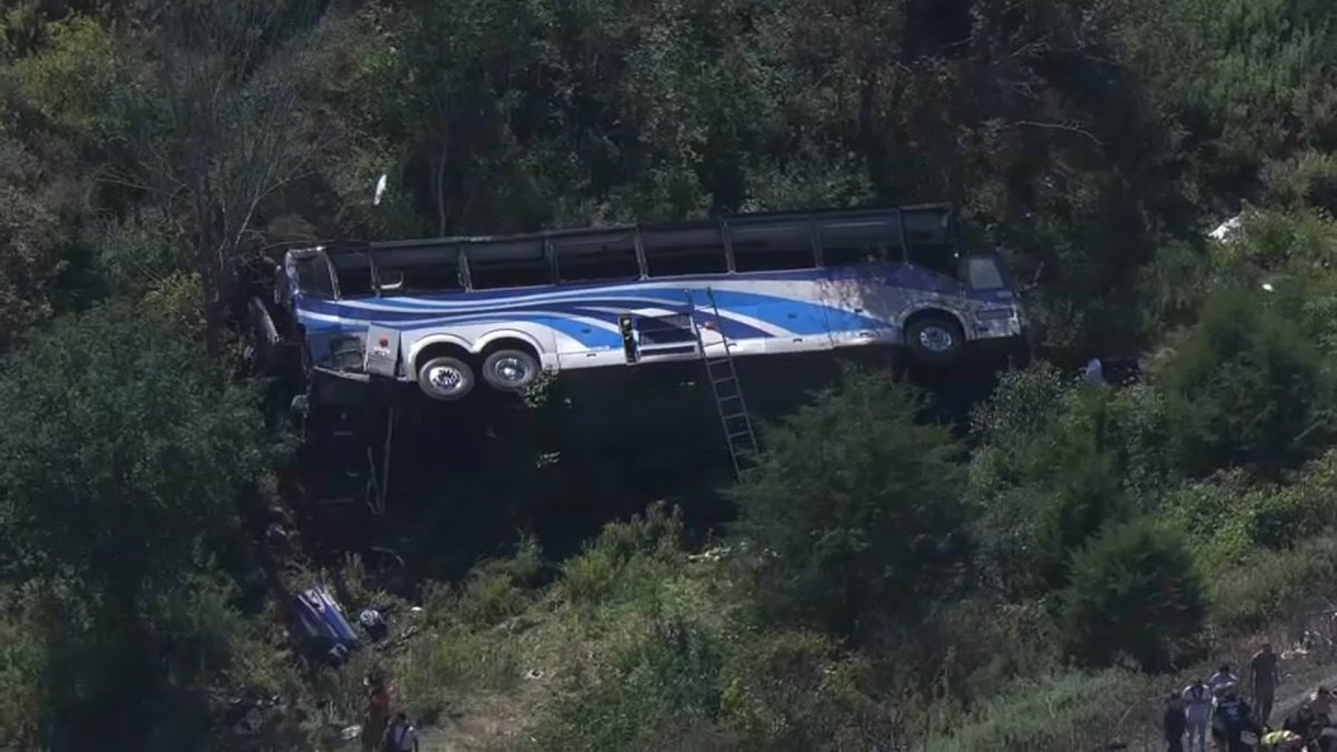 Bad tire likely sent NY high school band bus down I-84 ravine killing 2, hurting dozens
