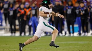 FRISCO, TX – DECEMBER 17: North Texas Mean Green quarterback Stone Earle (3) runs through the line of scrimmage during the Frisco Bowl between the North Texas Mean Green and the Boise State Broncos on December 17, 2022 at Toyota Stadium in Frisco, TX.