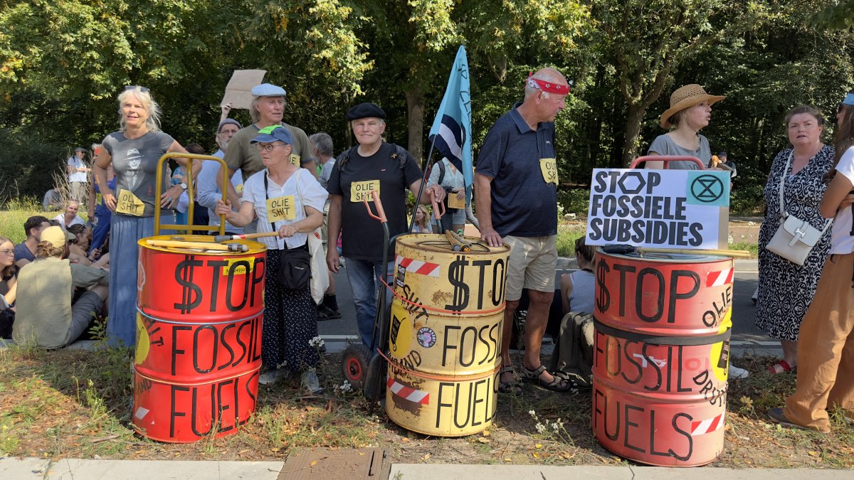 Tens of thousands march to kick off climate summit, demanding end to fossil fuels