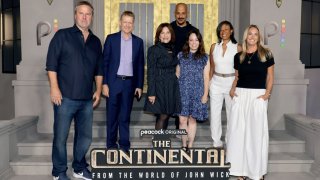 (L-R) Basil Iwanyk, Kevin Beggs, Chairman of Lionsgate, Sandra Stern, Vice Chairman of Lionsgate, Albert Hughes, Erica Lee, Val Boreland, and Kelly Campbell attend Peacock's "The Continental: From The World Of John Wick" at TCL Chinese Theatre