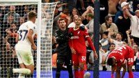 Matip's late own-goal hands Spurs a 2-1 win over defiant 9-man Liverpool