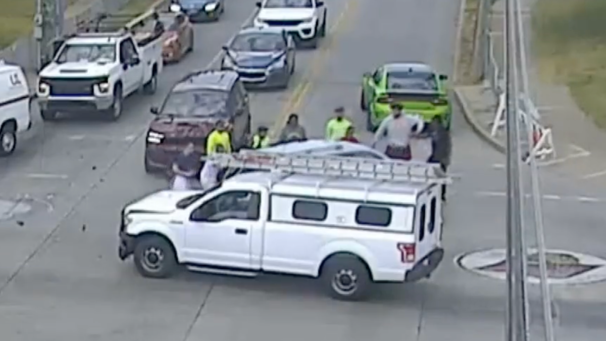 Watch: Louisville police credit Cardinals players for help in rescue of overturned car near their stadium
