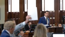 Prosecutor Daniel Dutko, objects as defense attorney Anthony Osso Jr. questions Grant Dorfman on Day 8 of the Ken Paxton impeachment trial, Thursday, Sept. 14, 2023, in Austin, Texas.