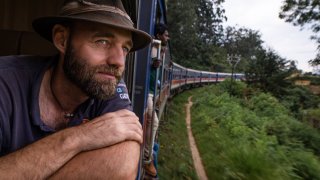 Torbjorn Pedersen riding the train in Sri Lanka, one of the 203 countries he visited in the last 10 years.