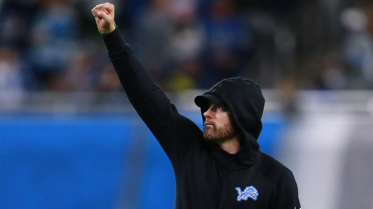 Eminem, 50, and daughter Hailie Jade, 27, enjoy time together as they  support hometown team Detroit Lions at Ford Field