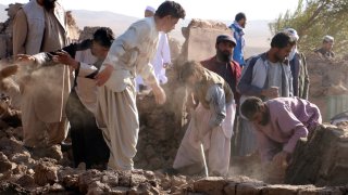 Afghan men search for victims after an earthquake in Zenda Jan district in Herat province, of western Afghanistan, Sunday, Oct. 8, 2023. Powerful earthquakes killed at least 2,000 people in western Afghanistan, a Taliban government spokesman said Sunday. It’s one of the deadliest earthquakes to strike the country in two decades. (AP Photo/Omid Haqjoo)