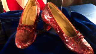 FILE – A pair of ruby slippers once worn by actress Judy Garland in the “The Wizard of Oz” sit on display at a news conference on Sept. 4, 2018, at the FBI office in Brooklyn Center, Minn.