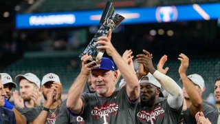 Texas Rangers manager Bruce Bochy celebrates after Game 7 of the baseball AL Championship Series against the Houston Astros Monday, Oct. 23, 2023, in Houston. The Rangers won 11-4 to win the series 4-3.