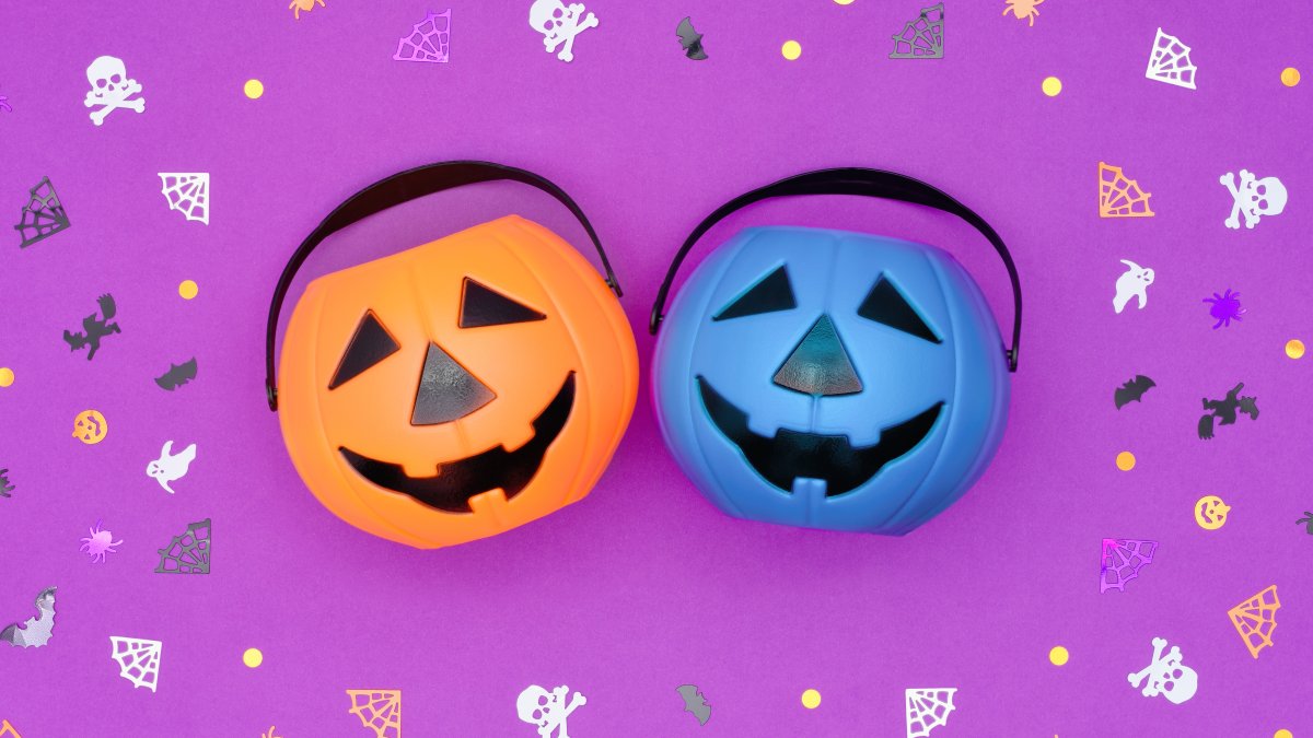 What do blue candy buckets on Halloween mean, and why are they controversial?