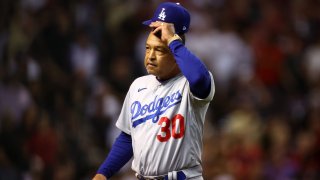 Los Angeles Dodgers manager Dave Roberts (30) reacts in the seventh inning against the Arizona Diamondbacks during Game 3 of the NLDS in the 2023 MLB playoffs at Chase Field.