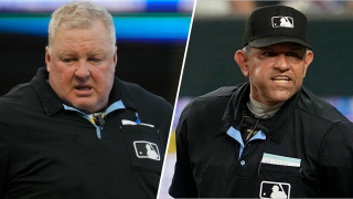 Umpire Bill Miller, left, and home plate umpire Alfonso Marquez, right.