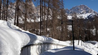 A view of the bobsled track in Cortina d’Ampezzo, Italy, Wednesday, Feb. 17, 2021.