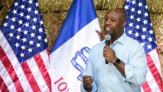 U.S. Republican presidential candidate Tim Scott speaks at the “Roast and Ride” event hosted by U.S. Senator Joni Ernst while campaigning in Des Moines, Iowa, U.S. June 3, 2023. 
