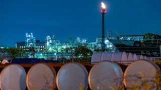 Storage drums stacked in the Keihin industrial area of Kawasaki, Kanagawa Prefecture, Japan, on Wednesday, Oct. 11, 2023.
